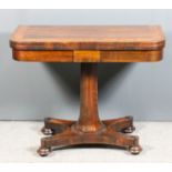 A George IV rosewood rectangular card table with rounded front corners, the baize lined folding
