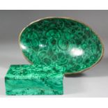 A malachite rectangular cigarette box, 5.25ins x 3.75ins x 2ins high, and a malachite and brass