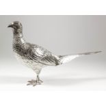 A mid 20th Century Continental silver model of a pheasant, 7.75ins high x 14ins overall, by Israel