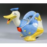 A Wadeheath pottery Donald Duck jug and cover, 5ins high