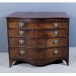 A George III mahogany serpentine fronted chest, the crossbanded top with moulded edge, fitted with