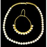 A 22ct gold mounted cultured pearl necklace, set with forty-three pearls of slightly graduating size