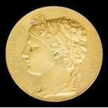 An 1878 Paris Exposition Universelle gold Prize Medal, by J.C.Chaplain, laureate bust of France