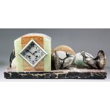 An early 20th Century marble cased mantel clock by Pouille-Delrue of Steennwerck of Art Deco design,
