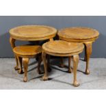 Four Kashmiri circular hardwood occasional tables with carved bands and crimped rims to tops, each