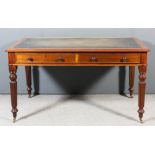 An early Victorian mahogany rectangular writing table with green leather inset to top and moulded