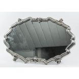 An early 20th Century German silvery metal oval table plateau of "early 18th Century" design, the