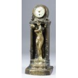A late 19th/early 20th Century French bronze and gilt bronze cased mantel timepiece, the 1.75ins
