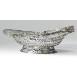 A George V Scottish silver oval cake basket of "George III" design, with pierced sides and ovoid