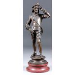 A late 19th Century French brown/green patinated bronze standing figure of a musician in 16th
