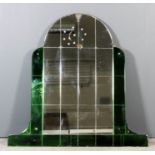 A pair of bevelled glass arched top rectangular wall mirrors of Art Deco design, inset with twelve