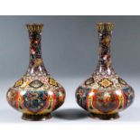 A pair of late 19th Century Japanese cloisonne vases in the style of Namikawa Yasuyuki (1847-