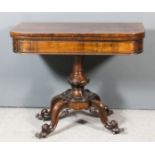 An early Victorian rosewood D-shaped card table with plain baize lined folding top, panelled frieze,