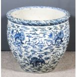 A Chinese blue and white porcelain jardiniere decorated with Kylin and cloud motifs within