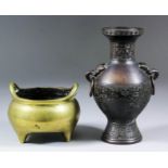 A Chinese brown patinated bronze two-handled vase of archaic form, 7.25ins (18.5cm) high, and a