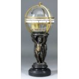 A 19th Century French "Globe" clock, the gilt brass framed globe top with twin enamelled chapter