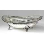 A good Victorian silver ovoid cake basket, the pierced rim with engraved banding to centre and