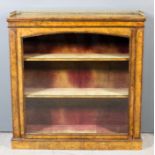 A Victorian figured walnut and gilt brass mounted dwarf display cabinet, the top with matched burr