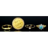 A George V 1915 half Sovereign in 9ct gold ring mount (size R), an 18ct gold wedding band and gem