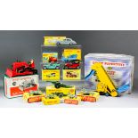 A small collection of Dinky diecast model vehicles, including - a Supertoys elevator loader No. 964,