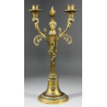 A 19th Century Continental gilt brass Empire style two-light candelabrum, 16.25ins high