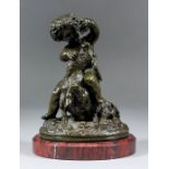A 19th Century French dark green patinated bronze group after Boucher - An infant bacchante