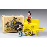 A Salco (1949) Mickey and Minnie's barrel organ handcart, with Minnie Mouse seated on top and Mickey