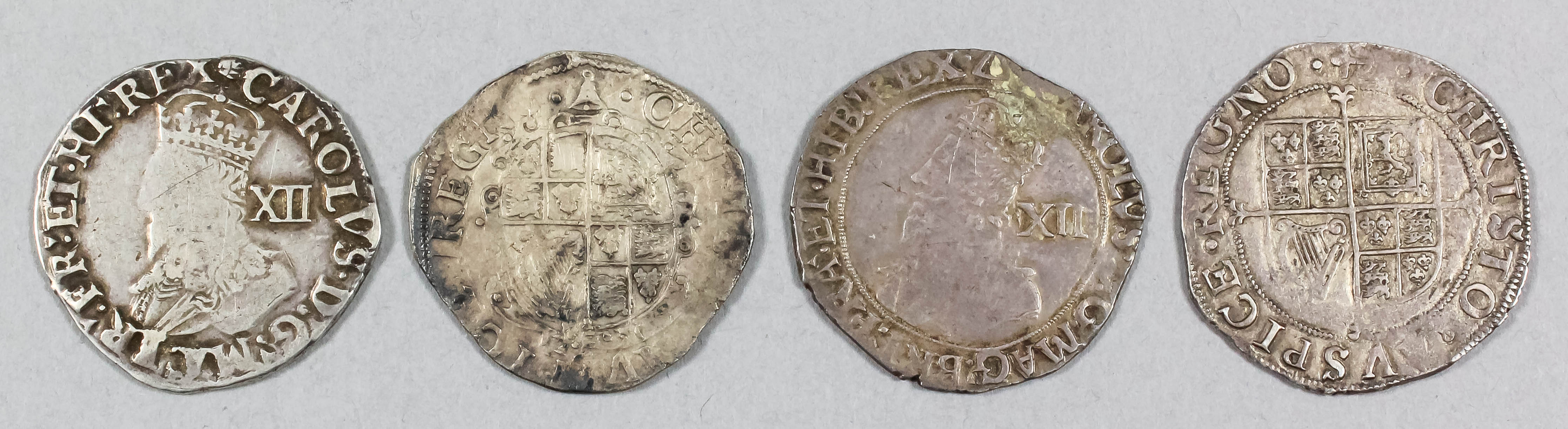 Four Charles I (1625-1649) shillings, mint marks Bell (1634-1635), Tun (1636-1638), Anchor (1636-