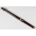 A 19th/20th Century rosewood one key piccolo, with nickel plated key and mounts, 14.75ins