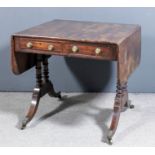 A George IV mahogany rectangular sofa table crossbanded in rosewood, fitted two real and two dummy