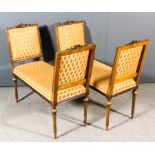 A pair of French walnut and parcel gilt window seats of "Louis XVI" design, the square show wood