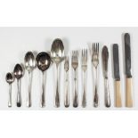 A plated part table service by Elkington & Co, comprising - twelve soup spoons, ten table forks,