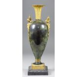 A gilt metal mounted marbled porcelain vase of slender form, with gilt mask mounts, 13.25ins high
