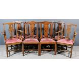 A harlequin set of eight oak dining chairs (including two armchairs) of "Country Chippendale"