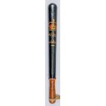 A Victorian turned wood truncheon, painted with crown over "Wilts Constabulary", on a black