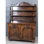 A Victorian mahogany chiffonier, the upper part with scroll carved cresting fitted three open