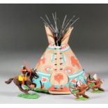 A rare Britains North American Indian teepee, 7ins high, together with three Herald Indian figures,