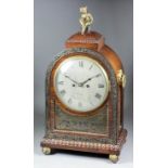A George IV rosewood and Boulle mantel clock by Fisher of Bath, the 8ins diameter silvered dial with