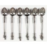 Six early 20th Century Continental silver "Apostle" pattern tea spoons with spiral twist and cast