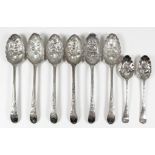Six Georgian silver "Berry" spoons, the bowls variously embossed, the terminals engraved with