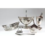 A George III silver oval sugar basket with bead mounts to bale handle and rim, plain body on oval