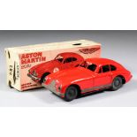 A Scalex tinplate Aston Martin DB2 friction drive car, with original box