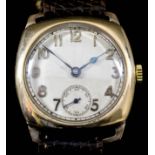 An early 20th Century gentleman's 9ct gold cased manual wind wristwatch, the cream circular dial
