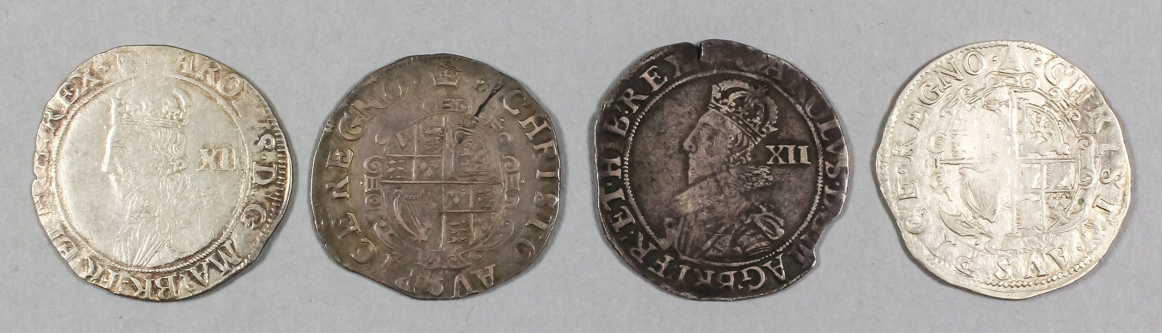 Four Charles I (1625-1649) shillings, mint marks Plume (1630-1631), Harp (1632-1633), Bell (1634-