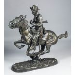 After Frederic Remington (1861-1909) - Dark green patinated bronze figure - "Trooper of the Plains",