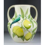 A modern Moorcroft pottery two-handled amphora-shaped vase designed by Sally Tuffin, tube lined