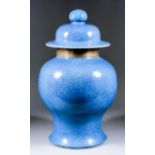 A Chinese porcelain blue ground baluster-shaped vase and cover, 16.25ins (41.3cm) high, with later