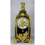 A Louis XIV tortoiseshell Boulle and gilt brass mounted mantel clock by J. F. Larse of Paris, the