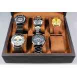 Three gentleman's quartz "Manchester United" wristwatches, and two other gentleman's quartz
