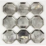 Nine Elizabeth II silver octagonal coasters, 3.25ins wide, by John Pinches Ltd, London 1968,